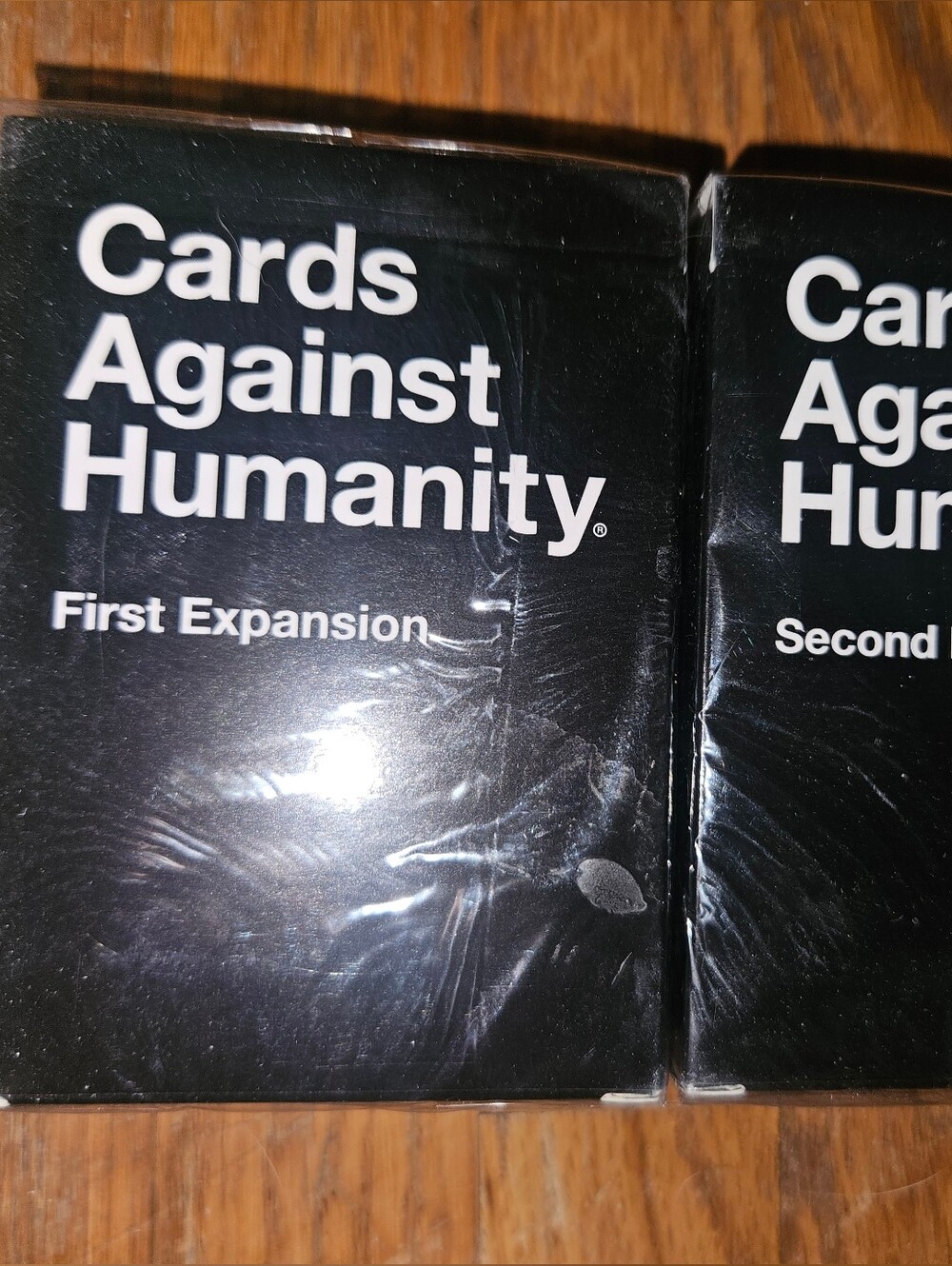 NWT Cards Against Humanity First & Second Expansions Set Of 2
